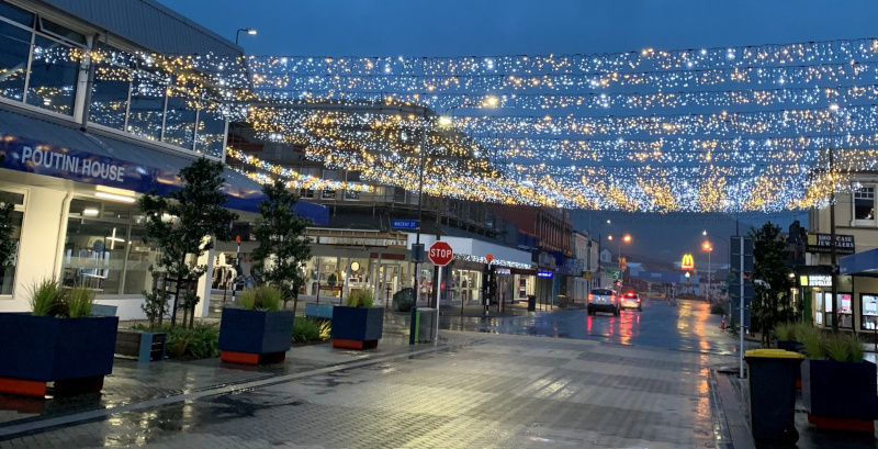 Grey District, New Zealand colored lights over the street.