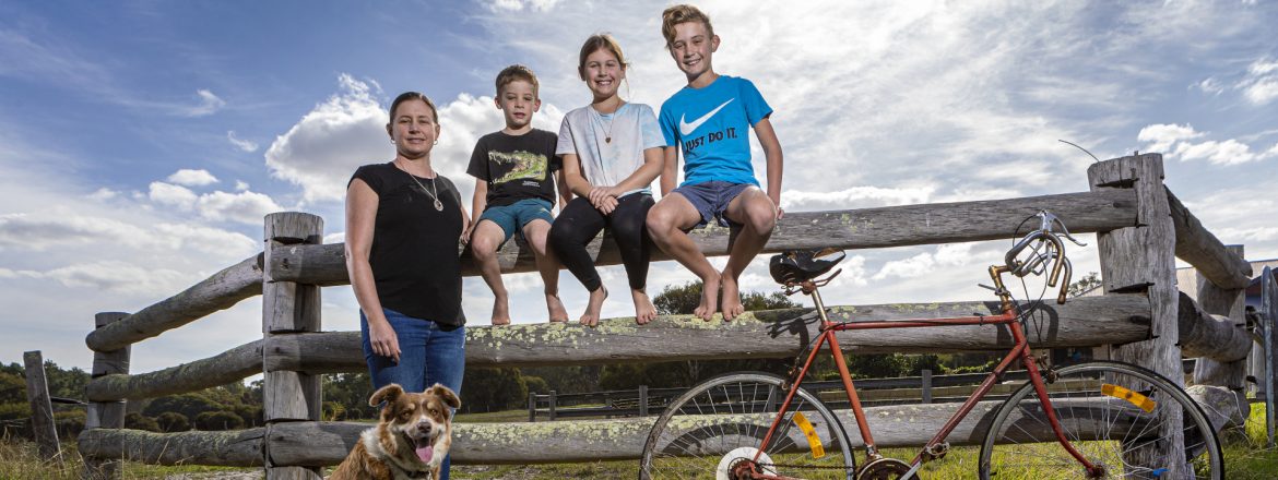 Shire of Dardanup, Western Australia family on fence